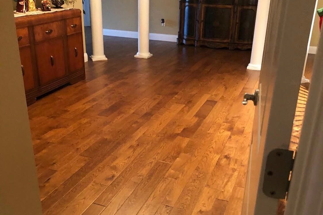 Waterproof luxury vinyl plank in a bright living room